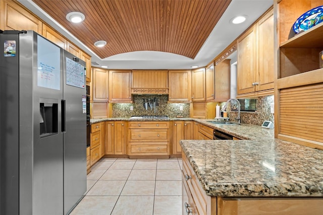 2306 S Valrico Rd, Valrico, FL 33596 - kitchen with stainless steel fridge, gas cooktop, light tile patterned flooring, light stone countertops, and wooden ceiling
