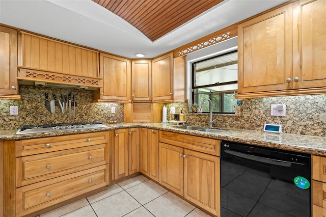 2306 S Valrico Rd, Valrico, FL 33596 - kitchen featuring dishwasher, lofted ceiling, light tile patterned floors, light stone countertops, and stainless steel gas stovetop