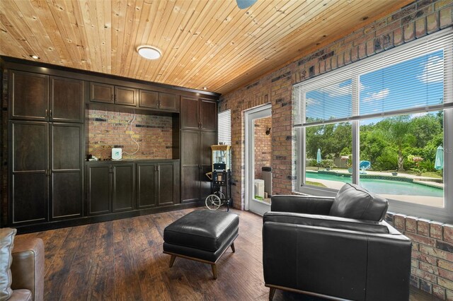 2306 S Valrico Rd, Valrico, FL 33596 - living area with brick wall, wooden ceiling, and dark wood-style flooring