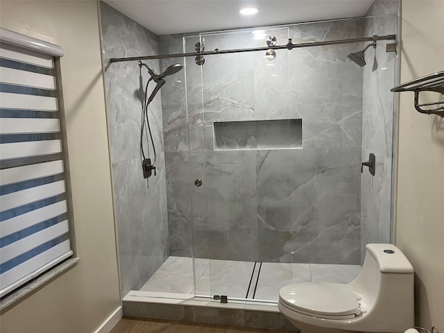 2306 S Valrico Rd, Valrico, FL 33596 - full bathroom featuring a marble finish shower, radiator, a towel warming rack, recessed lighting, and wood finished floors