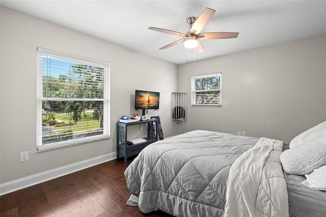 2306 S Valrico Rd, Valrico, FL 33596 - bedroom featuring wood finished floors, a textured ceiling, and ceiling fan
