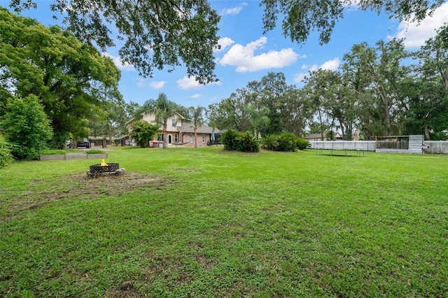 2306 S Valrico Rd, Valrico, FL 33596 - view of yard with an outdoor fire pit