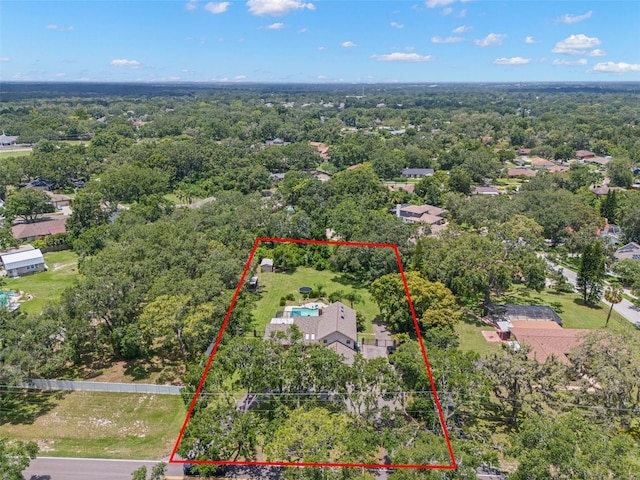 2306 S Valrico Rd, Valrico, FL 33596 - aerial view of property and surrounding area featuring property boundaries highlighted and a heavily wooded area