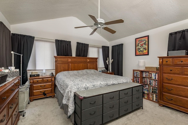7901 Marlboro Dr, Port Richey, FL 34668 - bedroom featuring lofted ceiling, light colored carpet, a textured ceiling, and ceiling fan