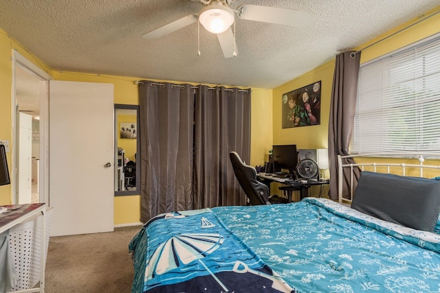 7901 Marlboro Dr, Port Richey, FL 34668 - carpeted bedroom featuring a textured ceiling, a ceiling fan, and a desk