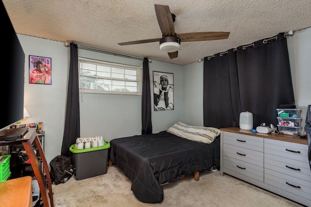 7901 Marlboro Dr, Port Richey, FL 34668 - bedroom featuring light carpet, a textured ceiling, and ceiling fan