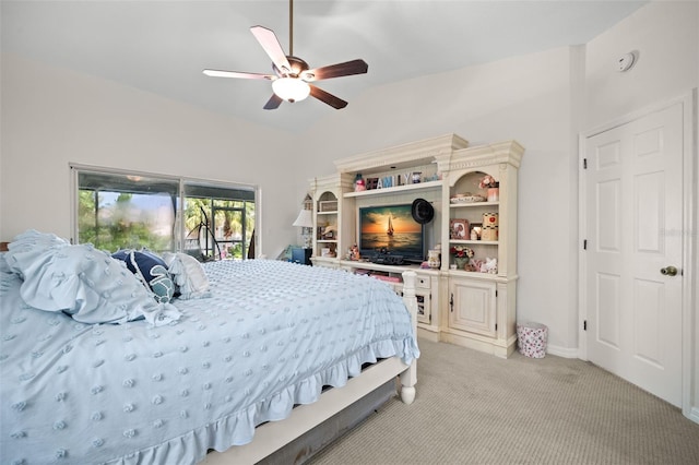 338 7th Ave N, Tierra Verde, FL 33715 - bedroom with light colored carpet, ceiling fan, access to outside, and vaulted ceiling