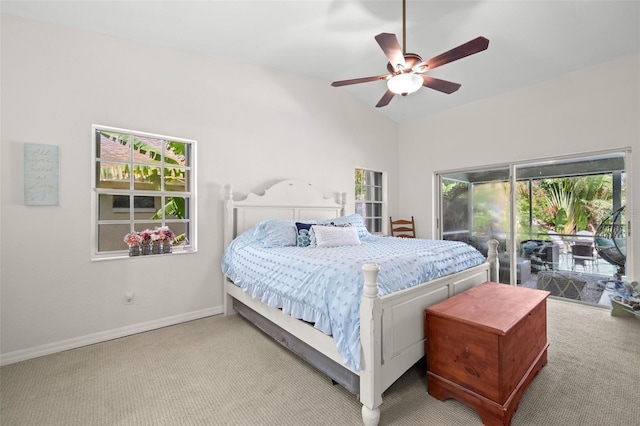 338 7th Ave N, Tierra Verde, FL 33715 - carpeted bedroom with access to exterior, multiple windows, baseboards, and a ceiling fan