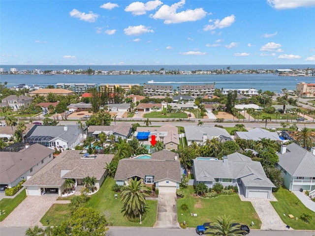 338 7th Ave N, Tierra Verde, FL 33715 - aerial perspective of suburban area with a large body of water