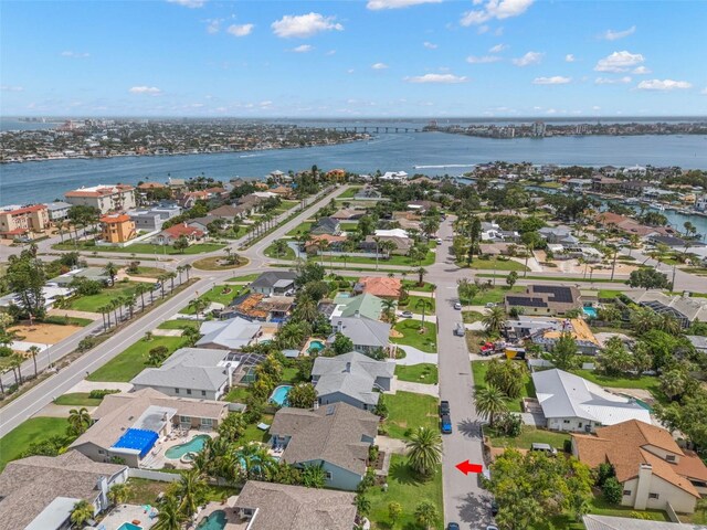 338 7th Ave N, Tierra Verde, FL 33715 - aerial perspective of suburban area with a nearby body of water