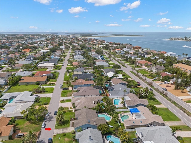 338 7th Ave N, Tierra Verde, FL 33715 - aerial perspective of suburban area featuring a large body of water and a pool