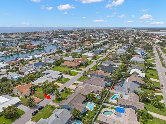 338 7th Ave N, Tierra Verde, FL 33715 - aerial view of property and surrounding area with a large body of water and nearby suburban area