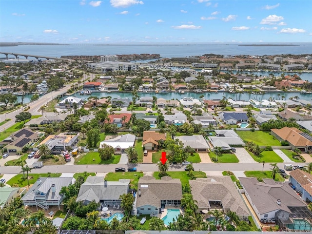 338 7th Ave N, Tierra Verde, FL 33715 - aerial perspective of suburban area featuring a large body of water