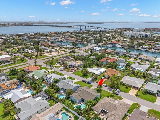 338 7th Ave N, Tierra Verde, FL 33715 - aerial view of residential area featuring a notable bridge and a nearby body of water