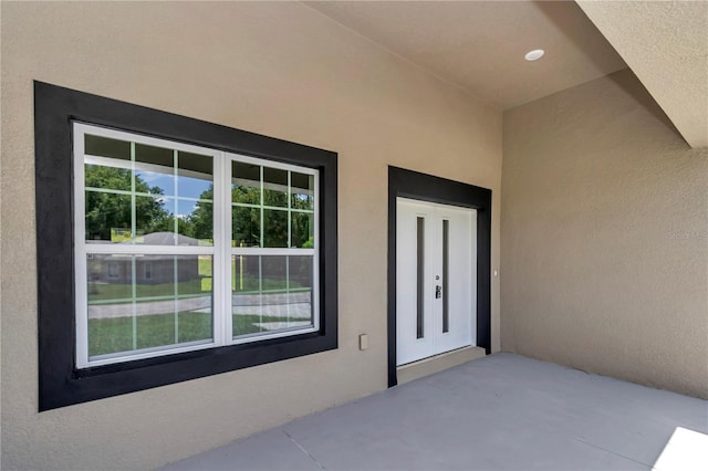 2705 W Royal Palm Dr, Citrus Springs, FL 34434 - property entrance featuring stucco siding
