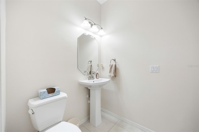 1178 Fraser Pine Blvd, Sarasota, FL 34240 - half bathroom with toilet, tile patterned flooring, and baseboards