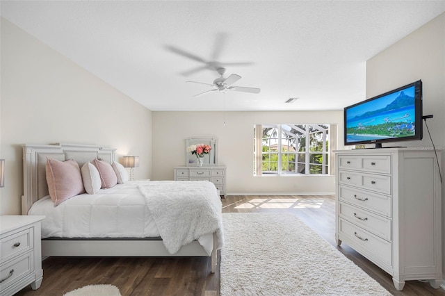 1178 Fraser Pine Blvd, Sarasota, FL 34240 - bedroom featuring dark wood-style flooring, ceiling fan, and baseboards