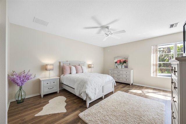 1178 Fraser Pine Blvd, Sarasota, FL 34240 - bedroom with dark wood-type flooring, baseboards, and ceiling fan