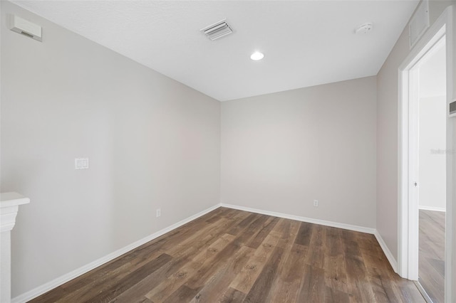 1178 Fraser Pine Blvd, Sarasota, FL 34240 - unfurnished room with wood finished floors, a smoke detector, baseboards, and recessed lighting