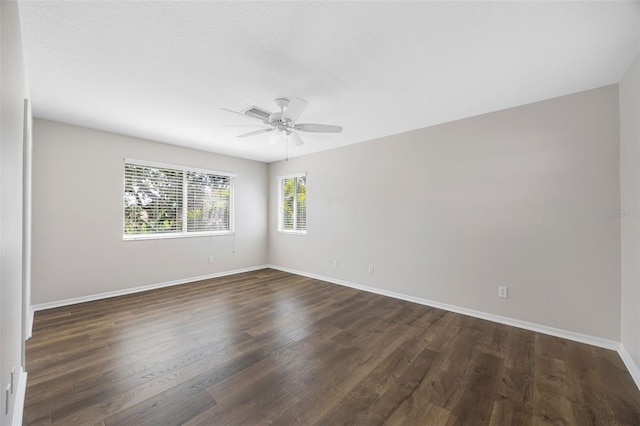 1178 Fraser Pine Blvd, Sarasota, FL 34240 - unfurnished room with dark wood finished floors, a ceiling fan, and baseboards