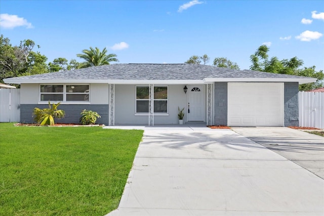 8030 Jasmine Blvd, Port Richey, FL 34668 - ranch-style home featuring concrete driveway, a garage, covered porch, stucco siding, and roof with shingles