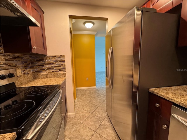 750 Island Way Unit 101, Clearwater Beach, FL 33767 - kitchen featuring stainless steel appliances, range hood, tasteful backsplash, ornamental molding, and light tile patterned floors