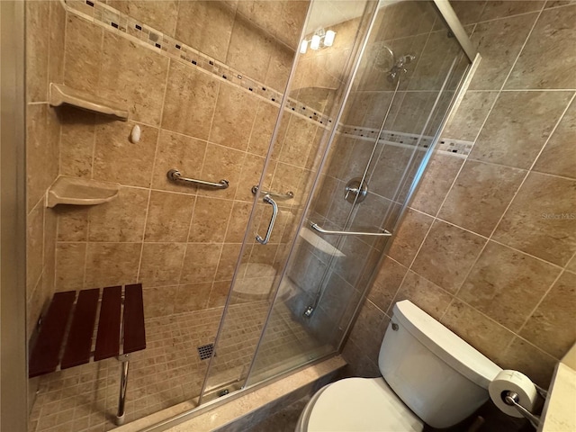 750 Island Way Unit 101, Clearwater Beach, FL 33767 - full bathroom with a stall shower and toilet