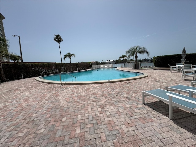 750 Island Way Unit 101, Clearwater Beach, FL 33767 - community pool with a patio
