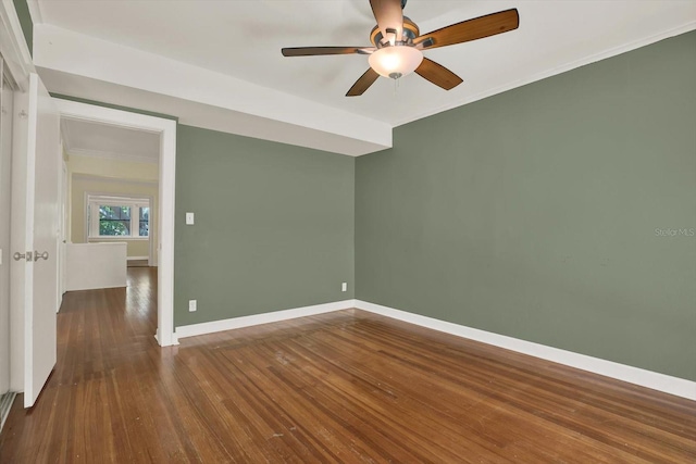258 14th Ave NE, Saint Petersburg, FL 33701 - empty room with a ceiling fan and dark wood finished floors