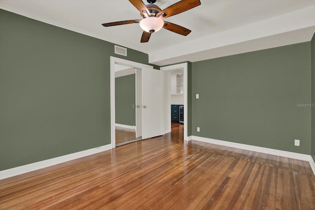 258 14th Ave NE, Saint Petersburg, FL 33701 - empty room with hardwood / wood-style flooring and a ceiling fan