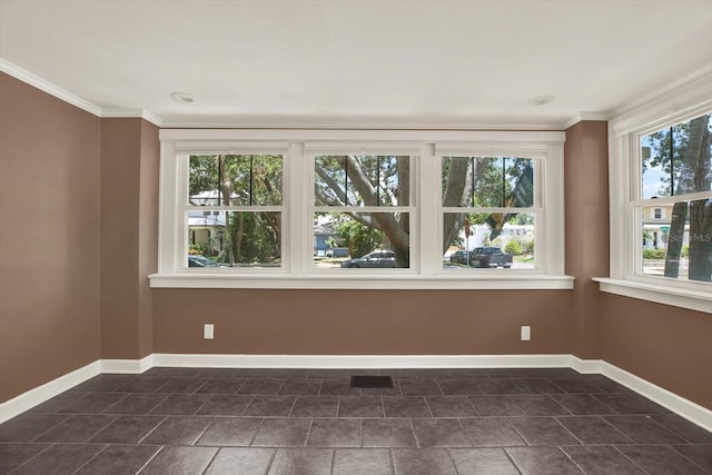 258 14th Ave NE, Saint Petersburg, FL 33701 - unfurnished room featuring baseboards and crown molding