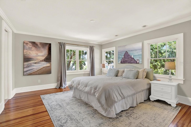 258 14th Ave NE, Saint Petersburg, FL 33701 - bedroom featuring light wood-style floors and ornamental molding