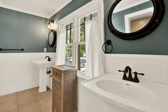 258 14th Ave NE, Saint Petersburg, FL 33701 - bathroom with a wainscoted wall, tile patterned floors, and crown molding