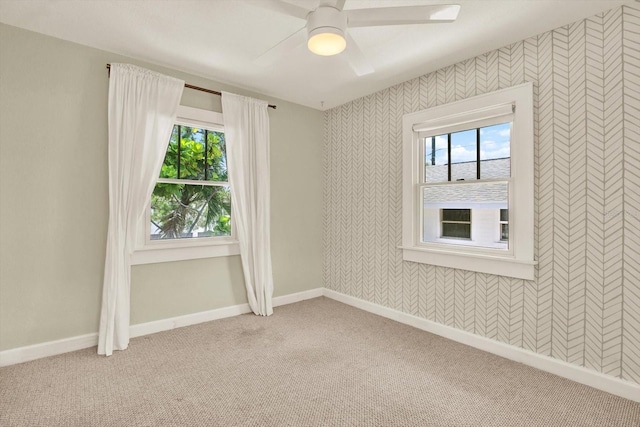 258 14th Ave NE, Saint Petersburg, FL 33701 - carpeted empty room featuring a ceiling fan and baseboards
