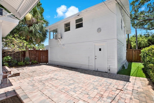 258 14th Ave NE, Saint Petersburg, FL 33701 - rear view of property featuring a patio