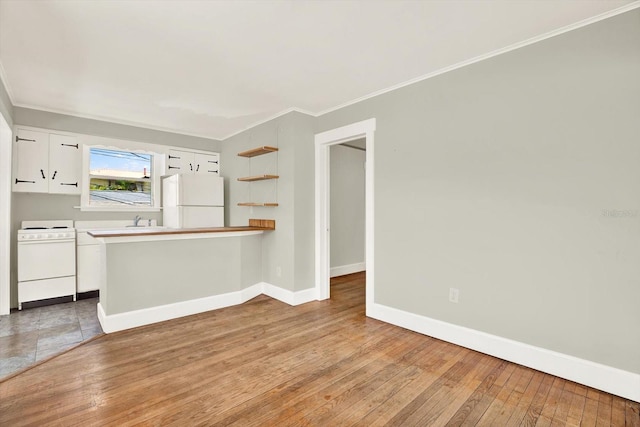 258 14th Ave NE, Saint Petersburg, FL 33701 - unfurnished room with ornamental molding and light wood-type flooring