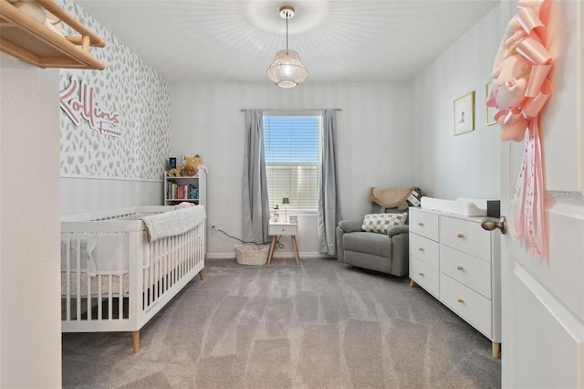 8210 Juning Cv, Wesley Chapel, FL 33545 - carpeted bedroom featuring a nursery area and baseboards
