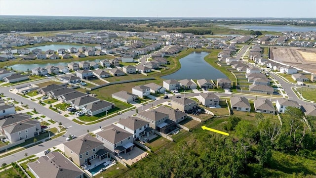 8210 Juning Cv, Wesley Chapel, FL 33545 - aerial view of property's location featuring nearby suburban area and a large body of water