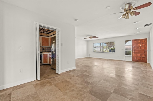 358 Suwanee Ave, Sarasota, FL 34243 - unfurnished living room with ceiling fan and stone finish flooring