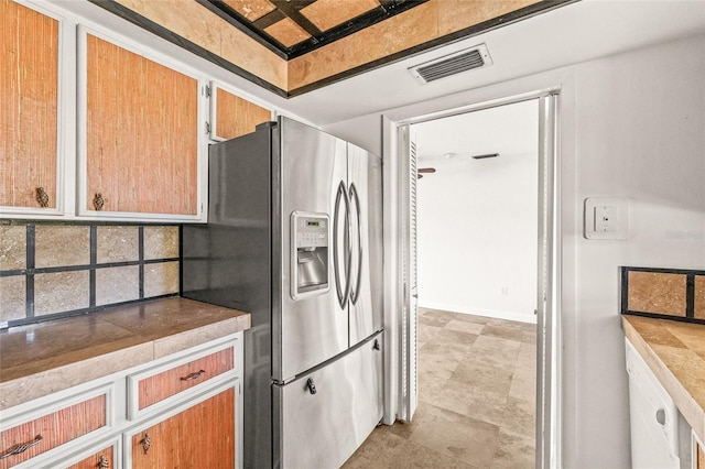 358 Suwanee Ave, Sarasota, FL 34243 - kitchen featuring stainless steel fridge and baseboards