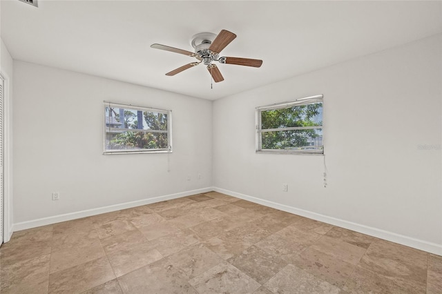 358 Suwanee Ave, Sarasota, FL 34243 - spare room featuring healthy amount of natural light and a ceiling fan