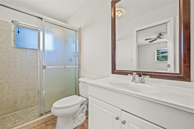 358 Suwanee Ave, Sarasota, FL 34243 - full bathroom with vanity, a shower stall, a ceiling fan, and tile patterned floors
