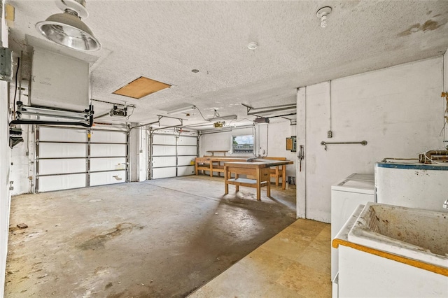 358 Suwanee Ave, Sarasota, FL 34243 - garage featuring a garage door opener and a sink