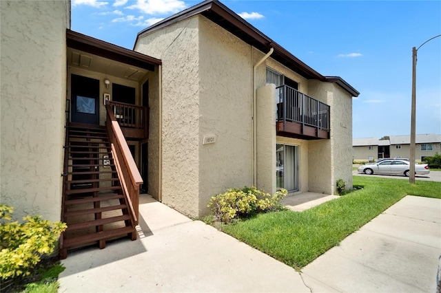 4215 E Bay Dr Unit 1801E, Clearwater, FL 33764 - view of property with stairs