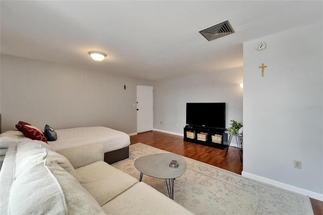 4215 E Bay Dr Unit 1801E, Clearwater, FL 33764 - living area with wood finished floors and baseboards
