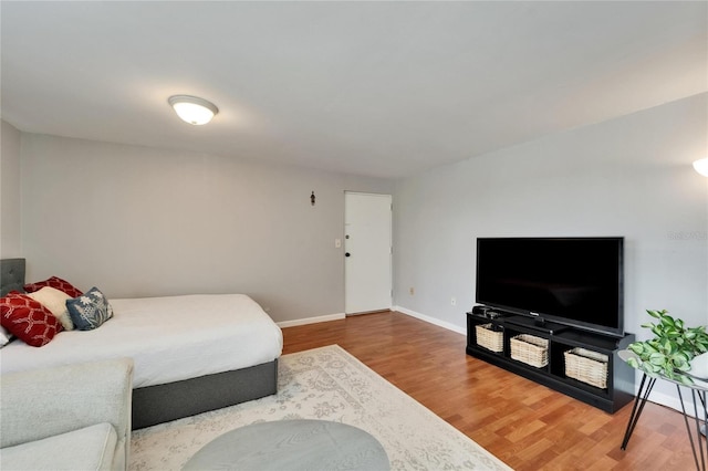 4215 E Bay Dr Unit 1801E, Clearwater, FL 33764 - bedroom with wood finished floors and baseboards