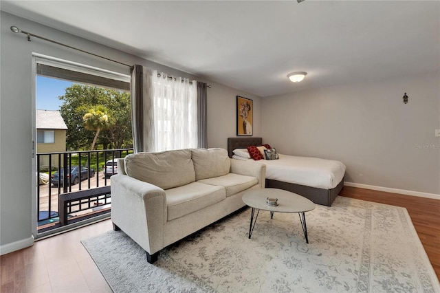 4215 E Bay Dr Unit 1801E, Clearwater, FL 33764 - living area featuring wood finished floors and baseboards