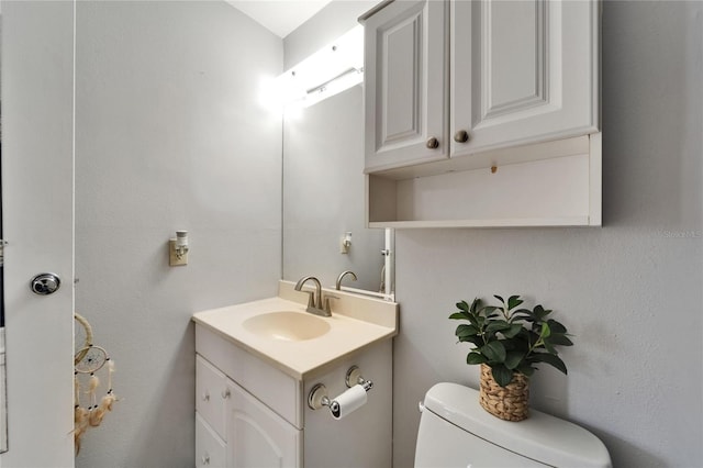 4215 E Bay Dr Unit 1801E, Clearwater, FL 33764 - bathroom featuring vanity and toilet