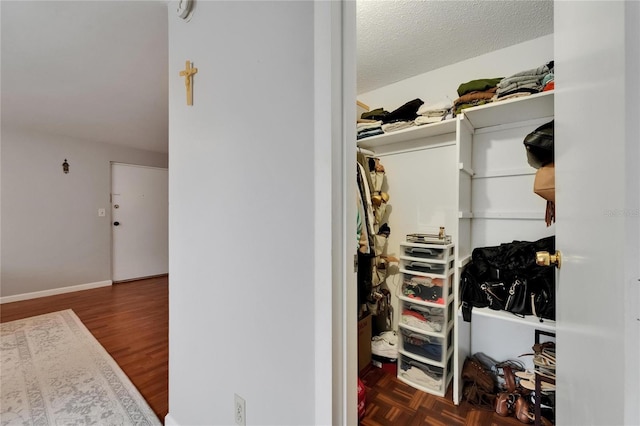 4215 E Bay Dr Unit 1801E, Clearwater, FL 33764 - walk in closet with wood finished floors