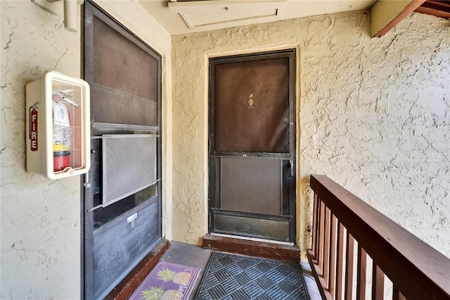 4215 E Bay Dr Unit 1801E, Clearwater, FL 33764 - doorway to property with stucco siding
